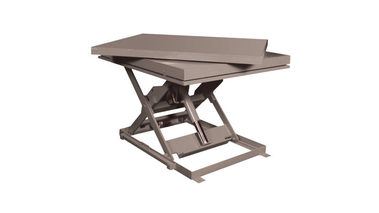 A gray turntable lift on a white background