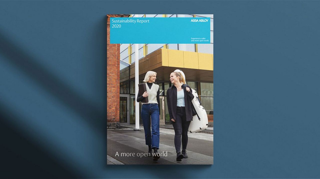 People on the cover of Sustainability report walking and talking.
