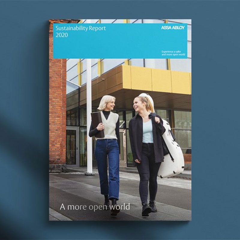 People on the cover of Sustainability report walking and talking.