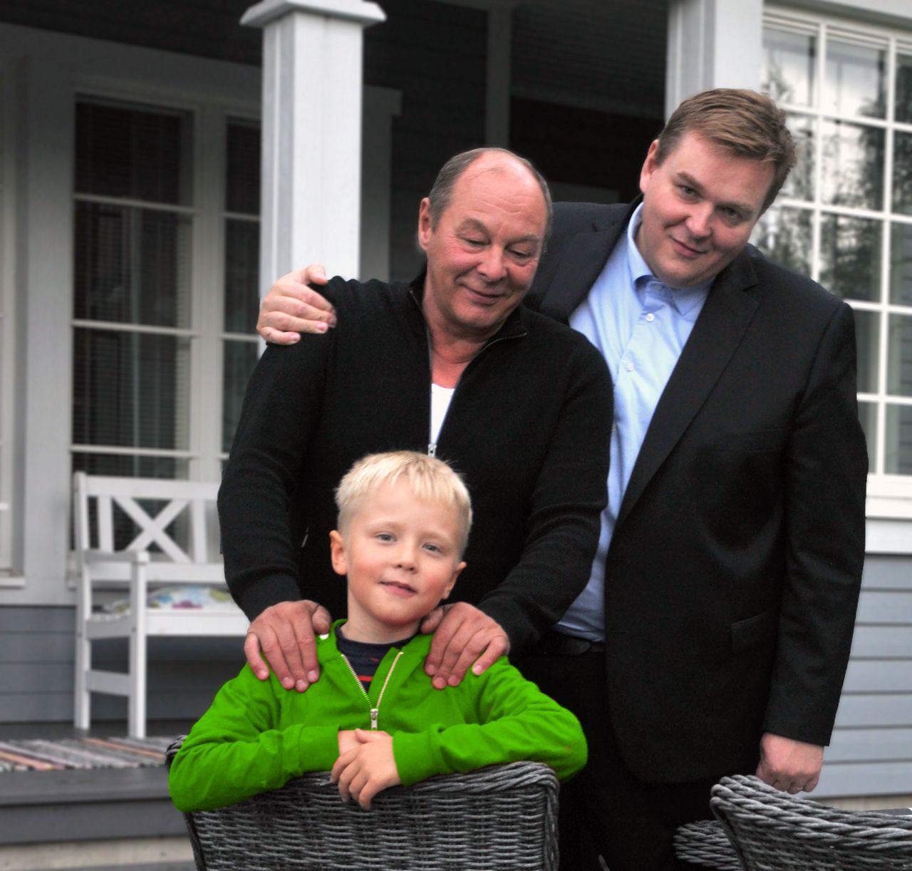 9solutions founder Sami Herrala with her child and father