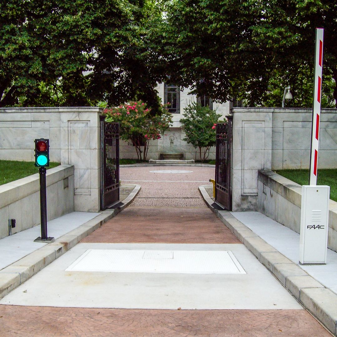 Sentinel wedge barrier retracted flush with roadway