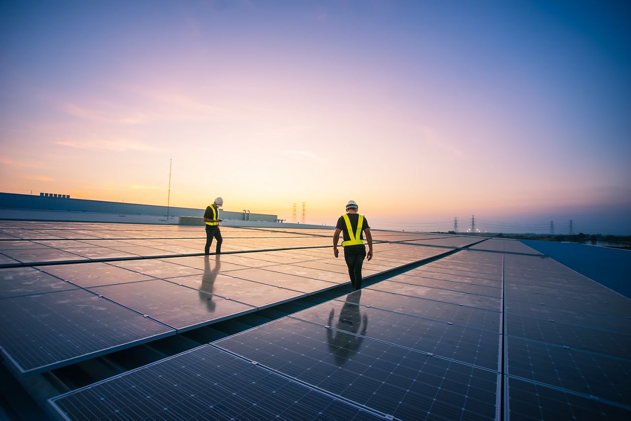 Solar panels on roof in sunset
