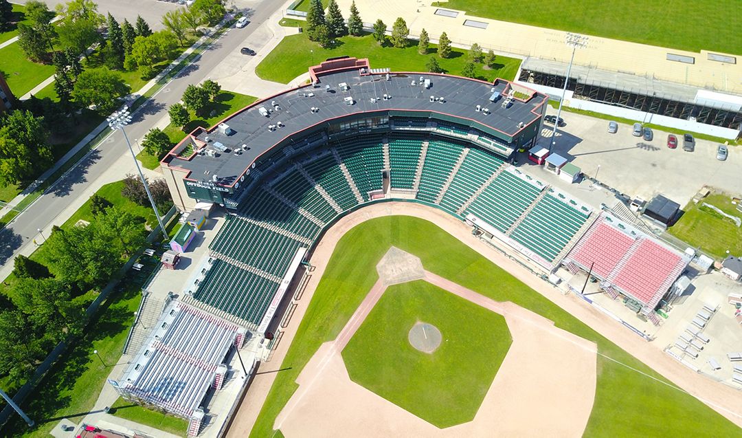 View of a baseball field and stadium from above.