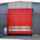 Porte automatique rapide rouge posée sur bardage métallique gris
