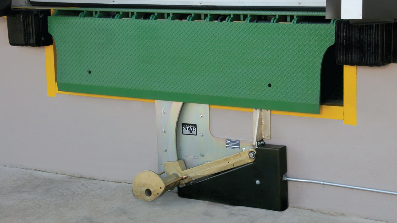 Close up of a Star4 vehicle restraint in use under a door.