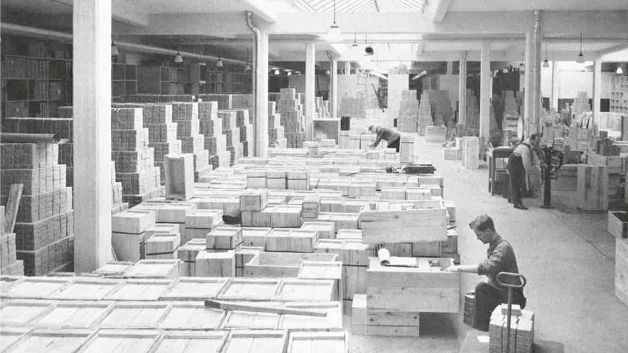Old picture of stock view of stock of wooden boxes in ASSA's factory.