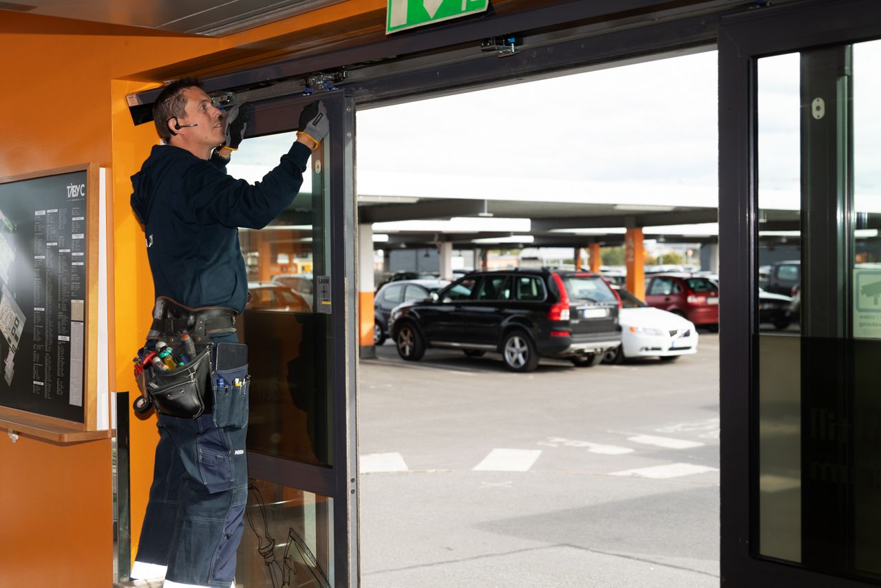 A sliding door installer working on a door. 