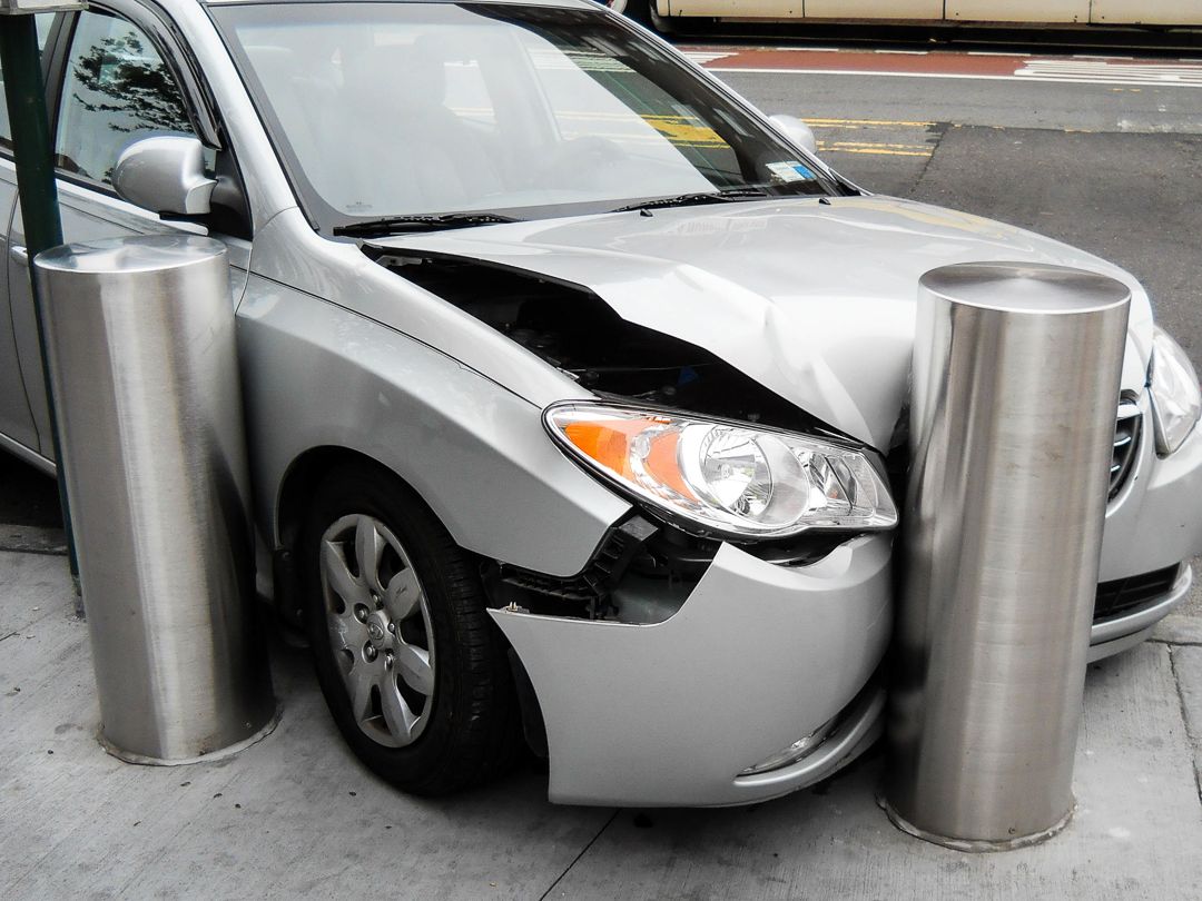 Ultra shallow mount bollards crash