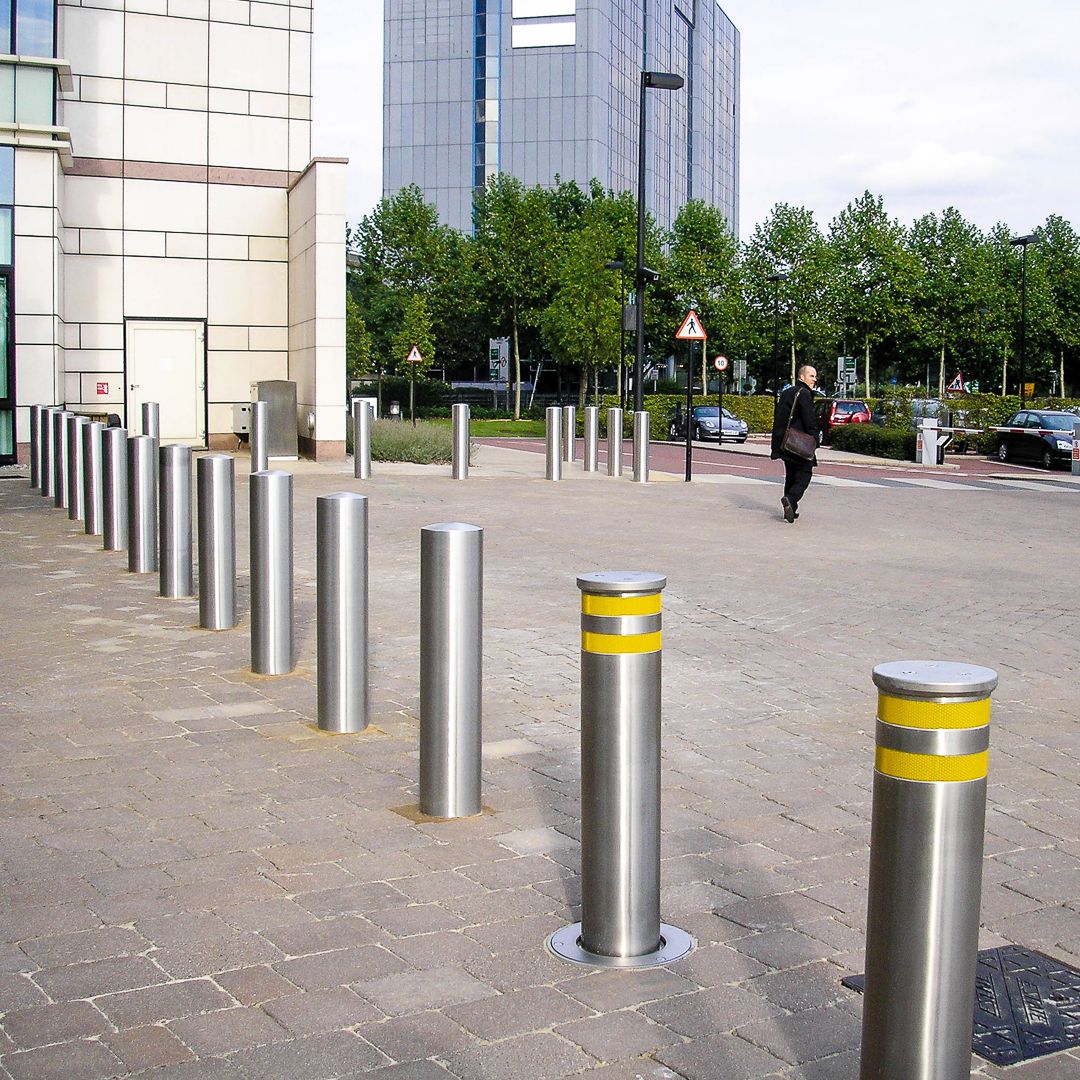 Ultra shallow mount bollards stainless steel with yellow stripes