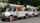 Utility vehicles parked on a suburban street