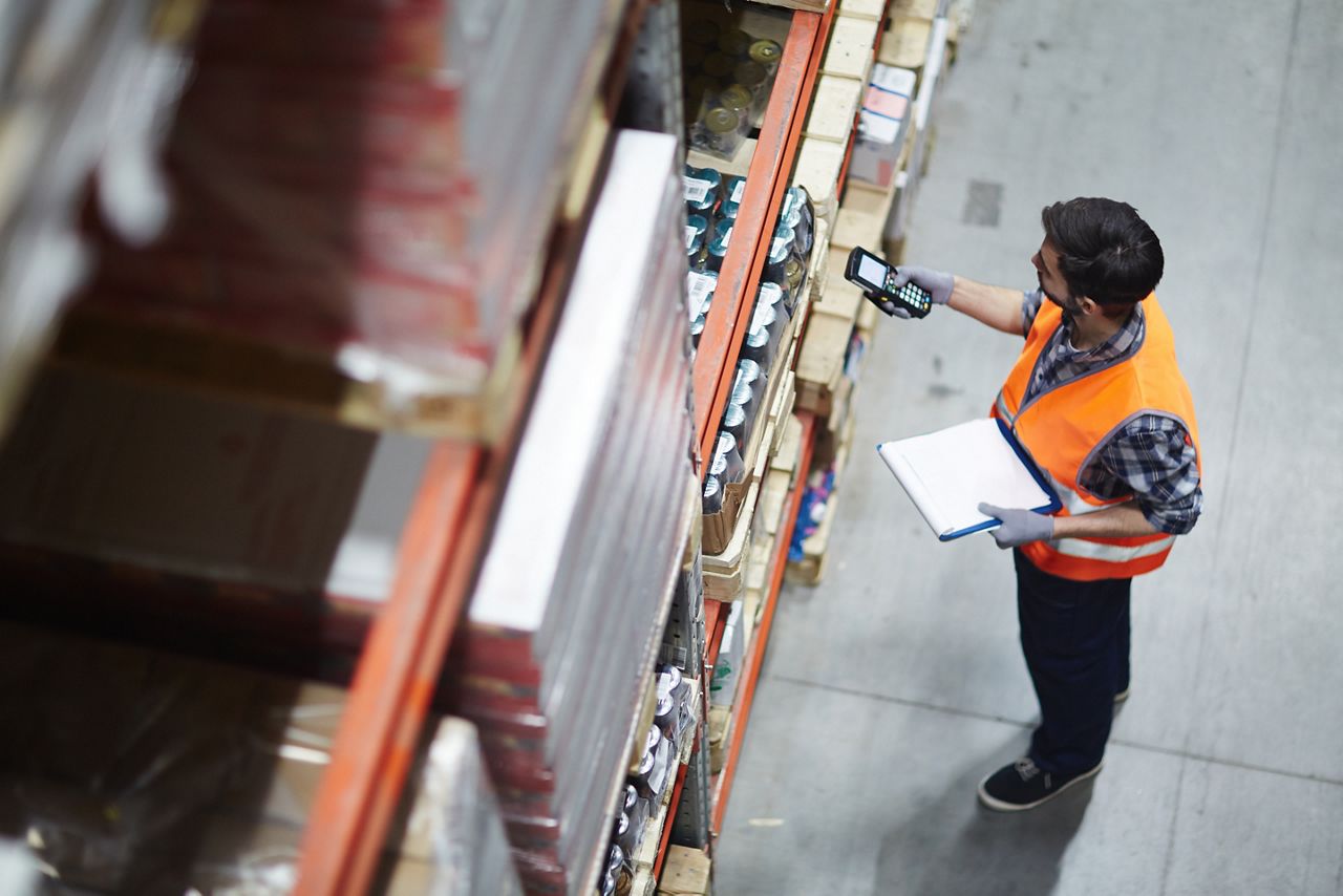 Warehouse worker scanning inventory