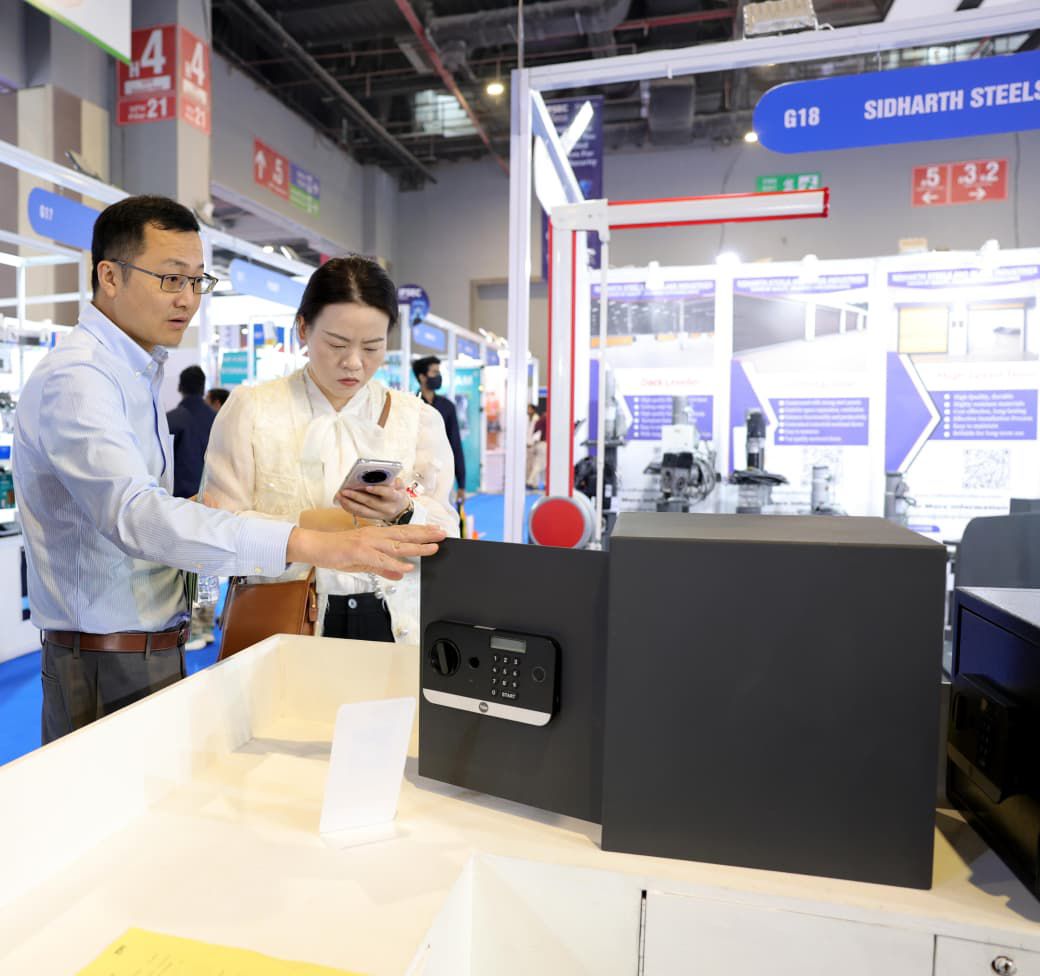 Visitors exploring Yale smart locks at IFSEC Expo Delhi
