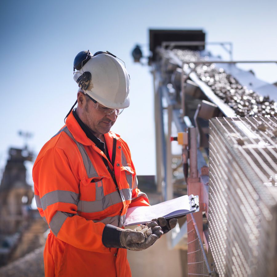 Worker with papers.