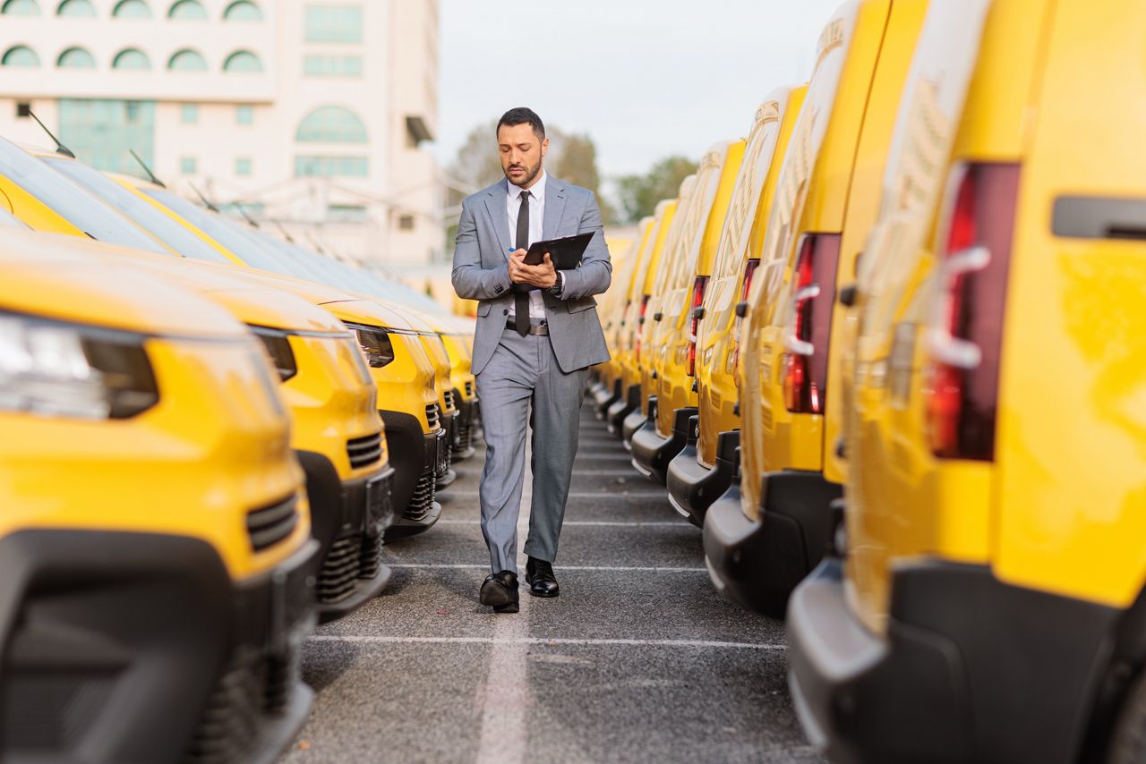 Fleet manager walking the lot