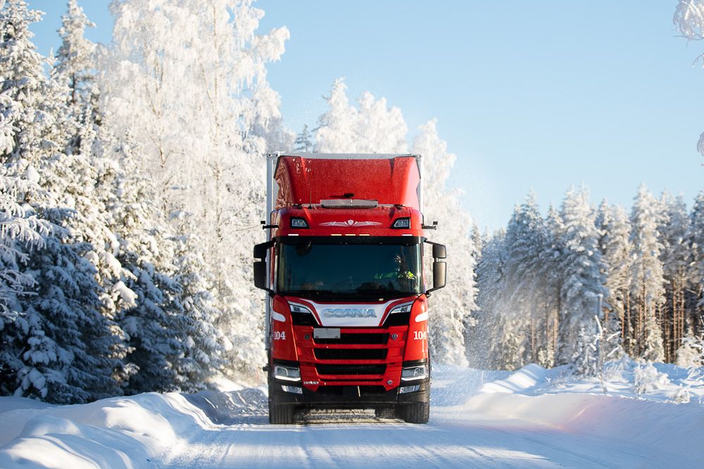 Truck on snowy road.
