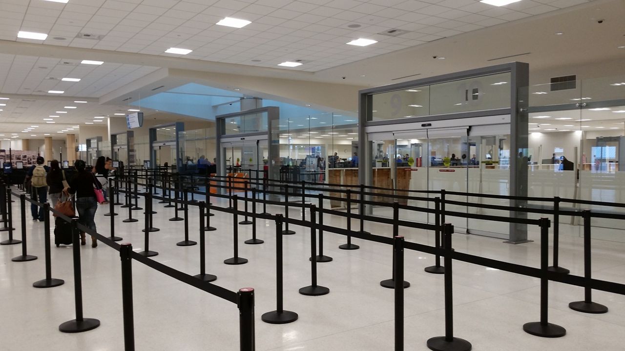 ASSA ABLOY SL500 CGL Slider at Aiport Facility