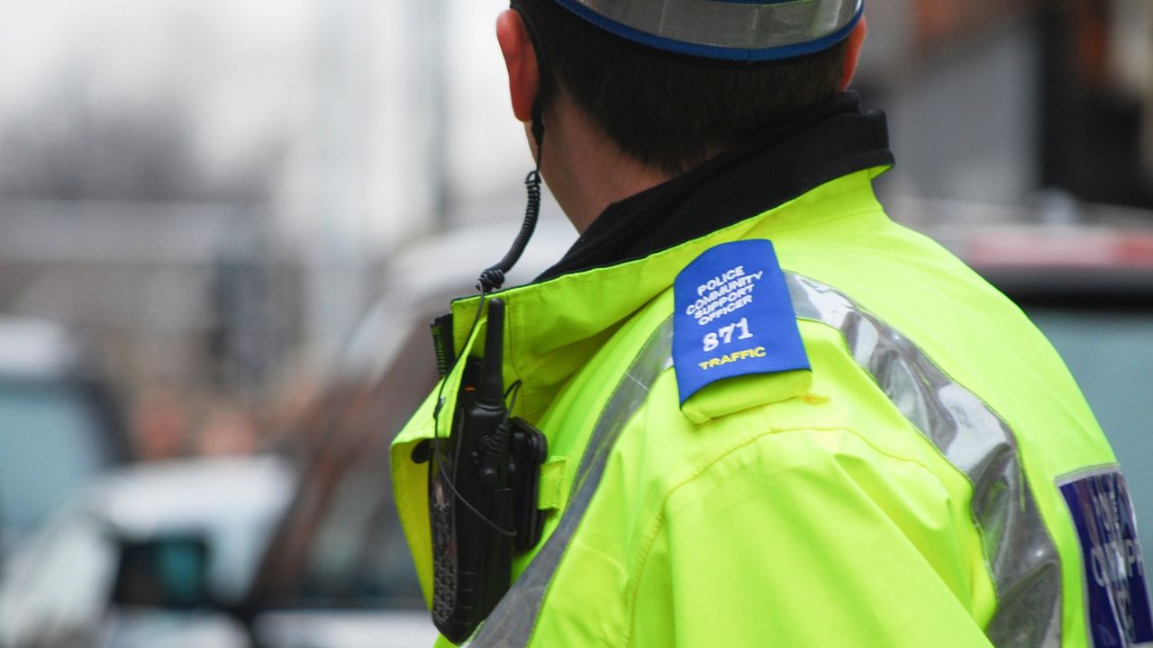 Traffic police officer with airwave radios