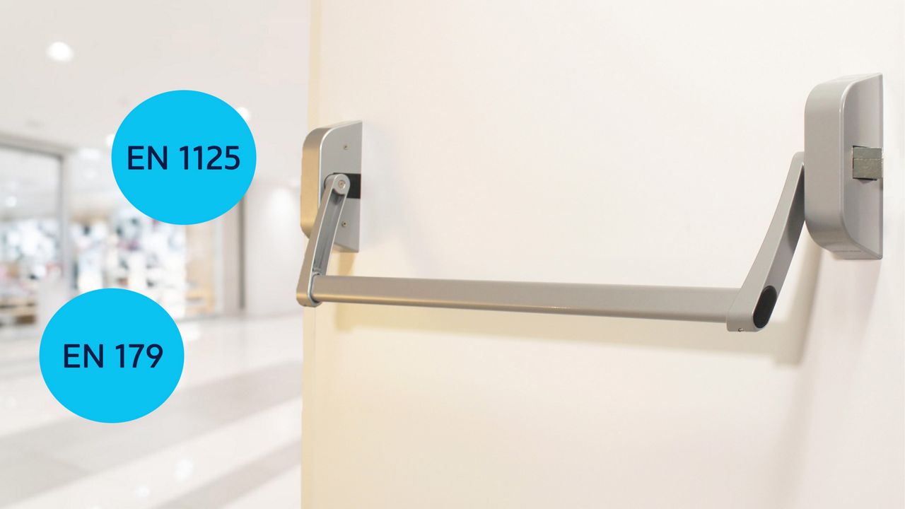 APOGEO Series 200 panic bar fitted to a door, with details of European standards