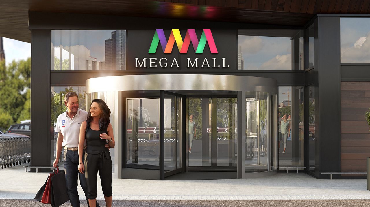 3D render of the The ASSA ABLOY RD3L High Capacity Revolving Door with people exiting through it.