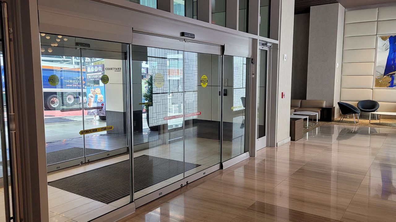Hotel entrance with glass lobby doors