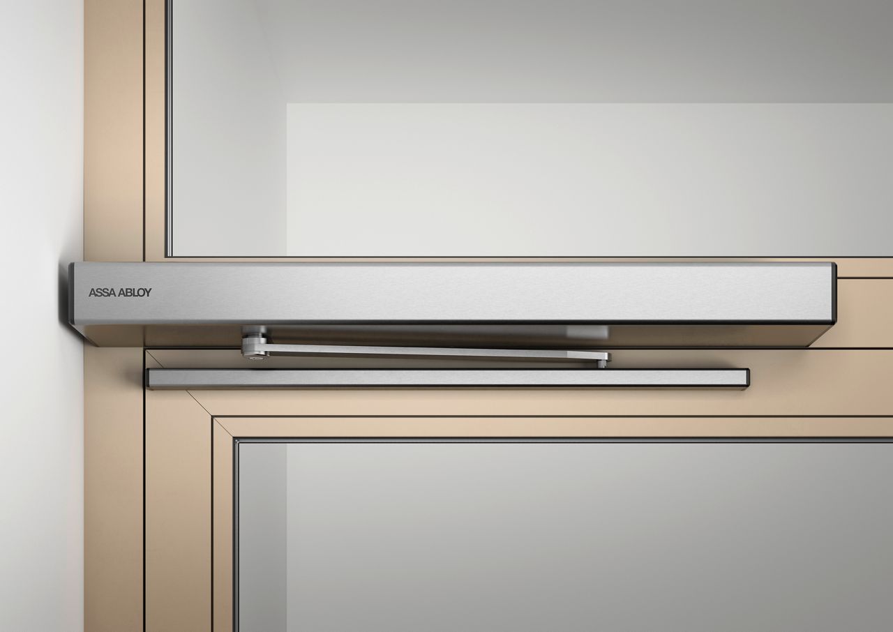Front view of the ASSA ABLOY SW300-S operator, showcasing its sleek and compact design.