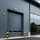 An external image of a Crawford OH1042P overhead sectional door at Tesla Centre Cambridge
