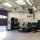 An internal image of a Crawford OH1042P overhead sectional door installed on a service bay at a Porsche garage