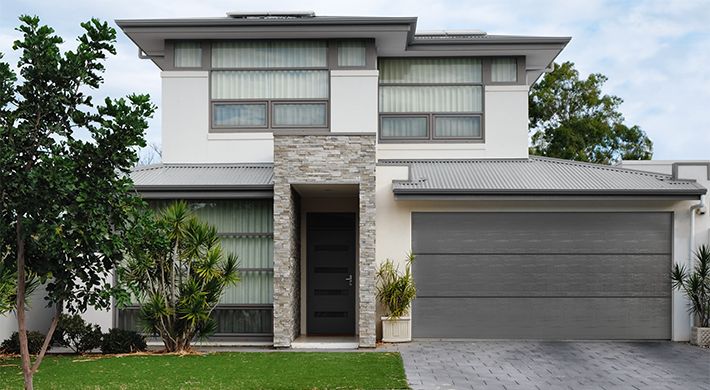 Trend Alert: Gray and Black Garage Doors are Popping Up Everywhere