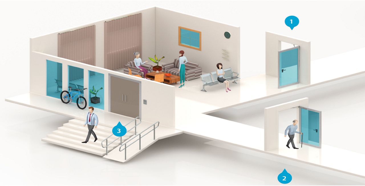 Bâtiment accessible grâce aux ferme-portes ASSA ABLOY