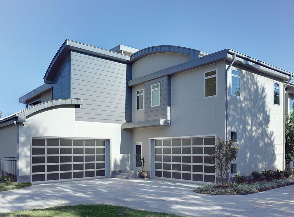 Amarr Full View anodized garage door on a modern home