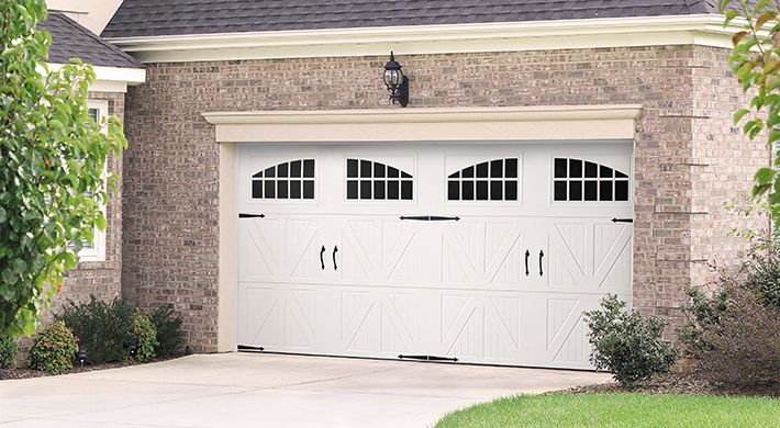 Hinges and handles can be added alongside garage door windows to give your home a unique visual appeal.