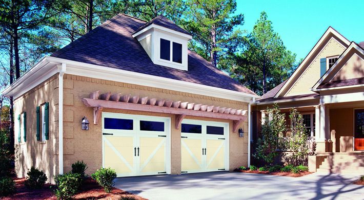 The addition of hinges and handles works equally well for two tone garage doors with windows