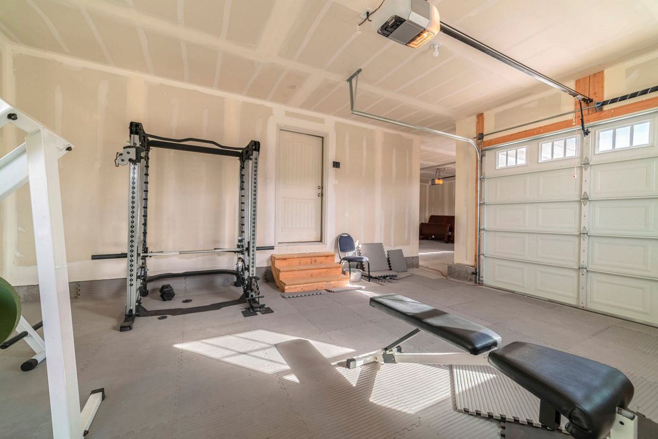 Your garage offers a number of unique home renovation opportunities such as a spacious workout room.