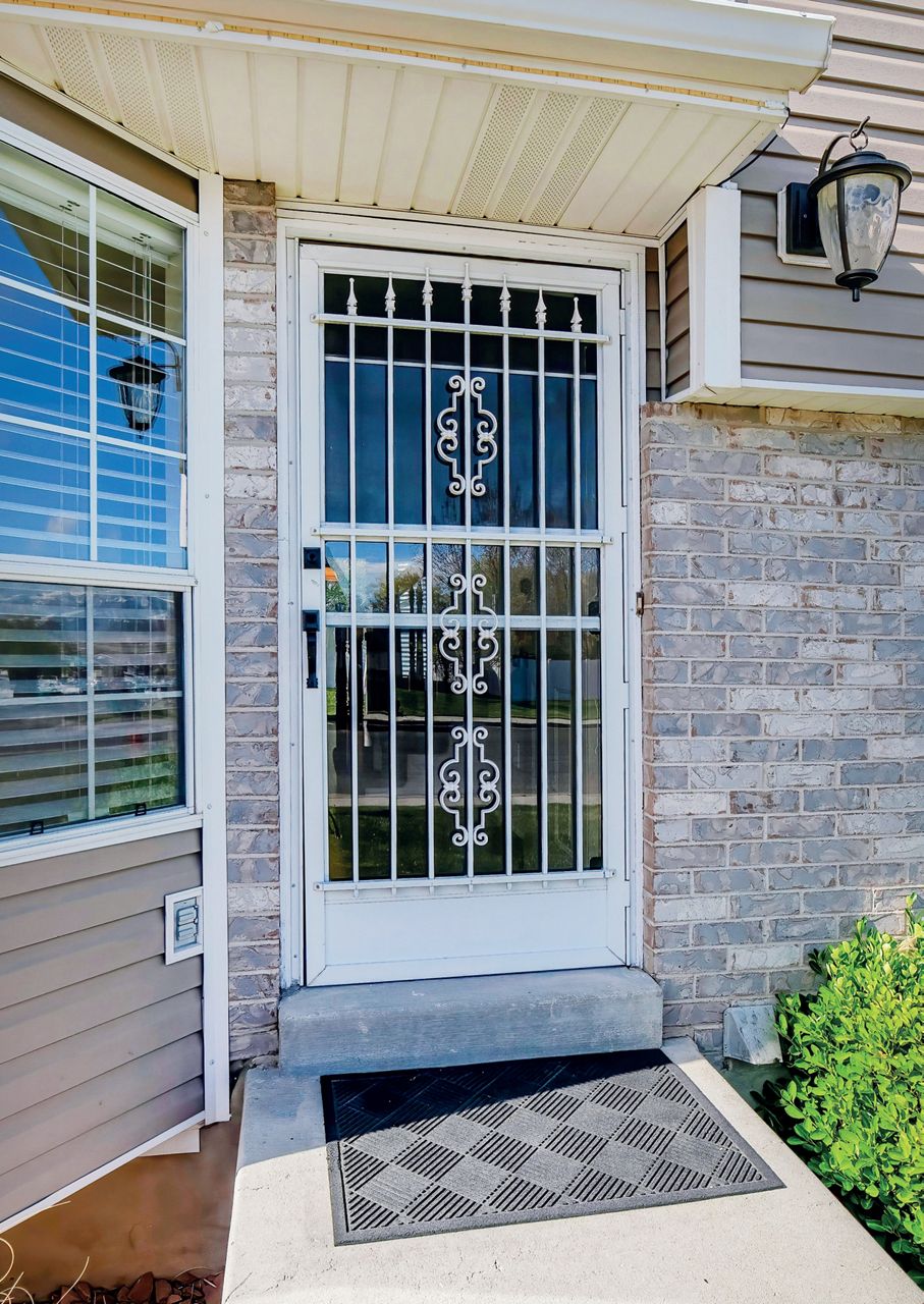 Image: Serratura per tubolari installata su cancelletto