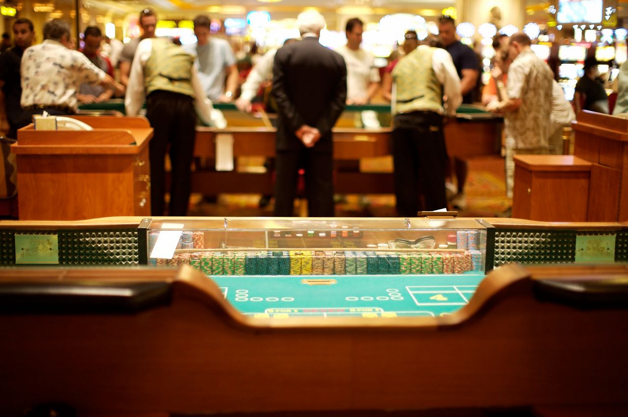 Table staff working on the casino floor