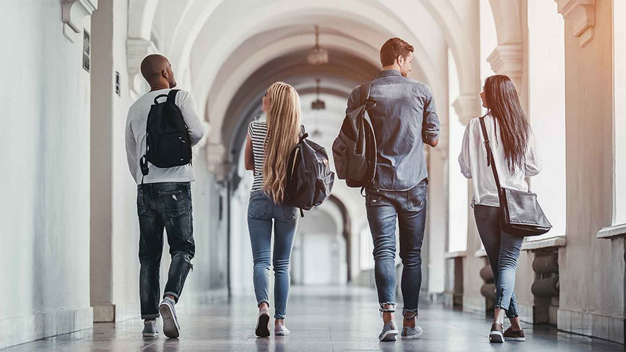 Students walking down a corridor