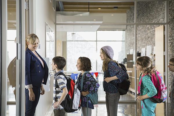 children entering a classroom 