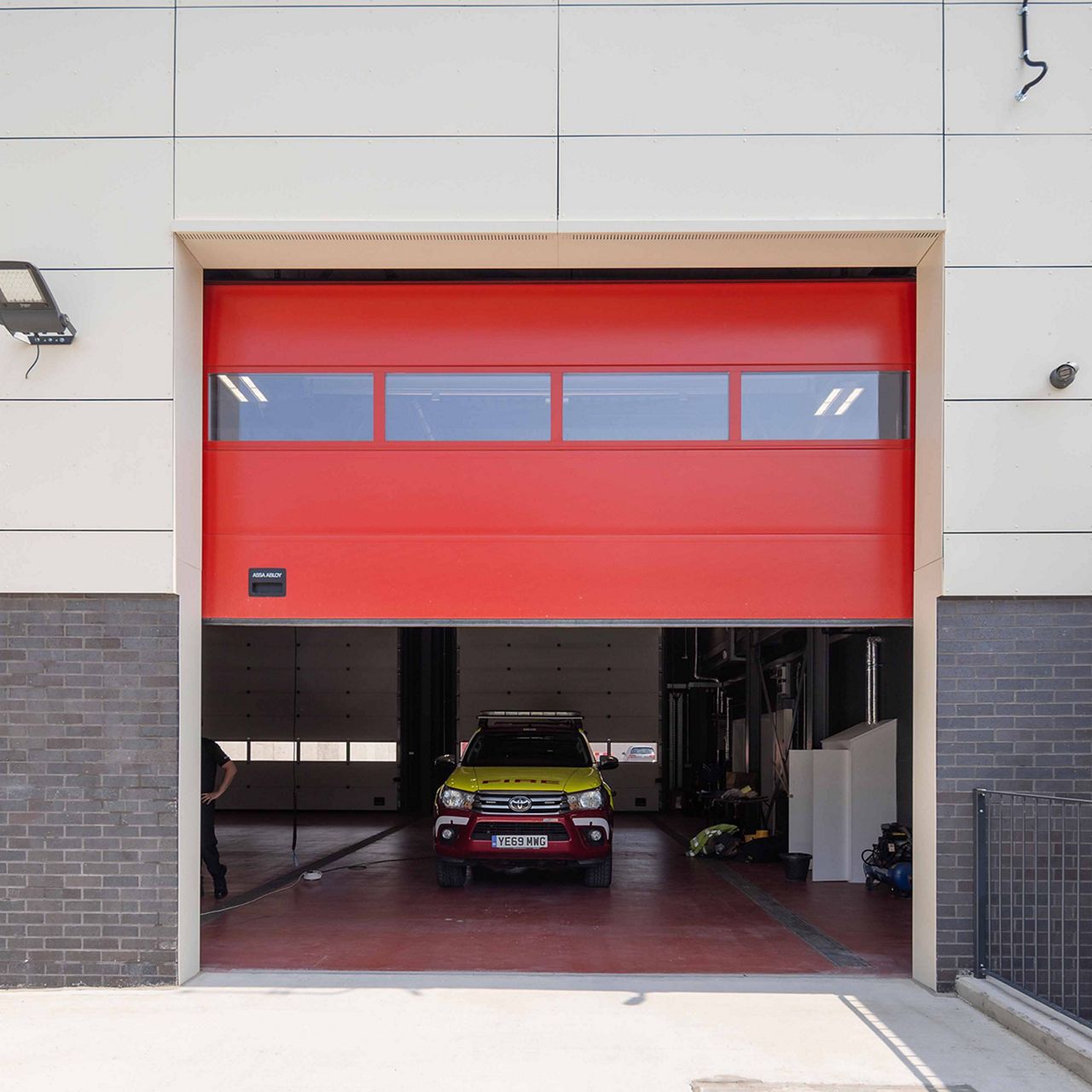 Crawford OH1042S appliance bay overhead sectional doors at West Yorkshire Fire and Rescue Service Headquarters in Birkenshaw
