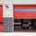 An external image of a Crawford OH1042S overhead sectional doors open with a fire truck 