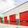 A row of Crawford OH1042S fast opening overhead sectional doors at a UK fire station