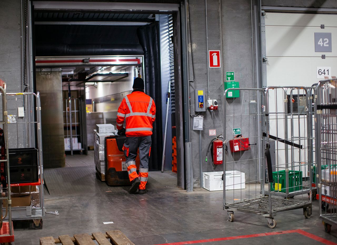 Man working at a warehouse.