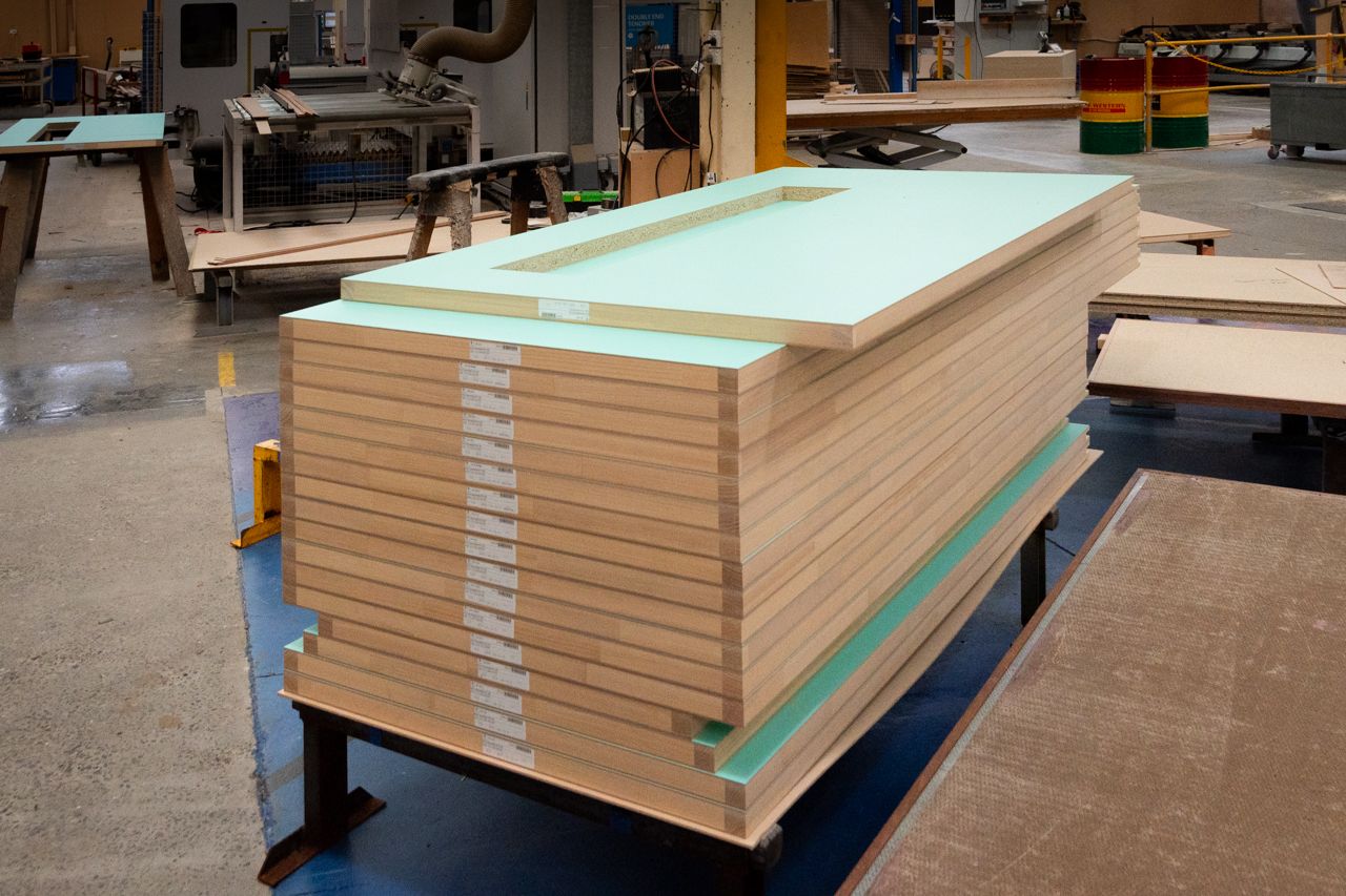 A palleted stack of doors in Spence Doors factory