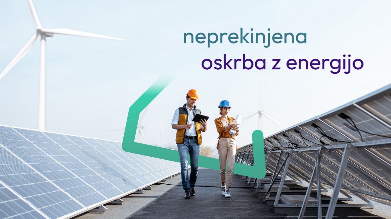 Dva delavca na sončni elektrarni.