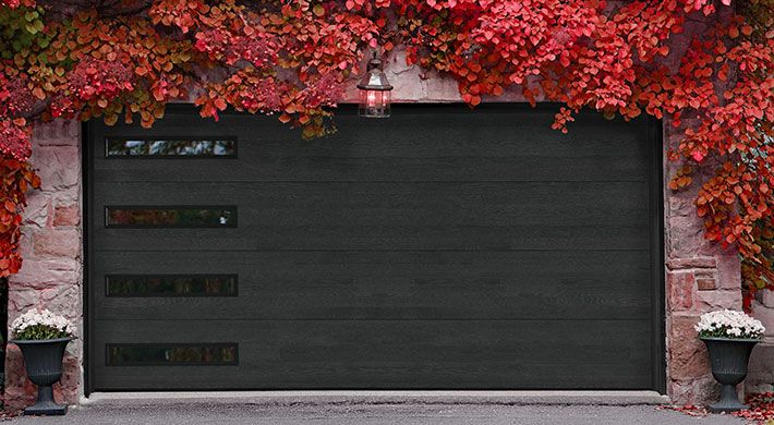 Northwoods plank garage door in Onyx with SlimLine Mosaic windows