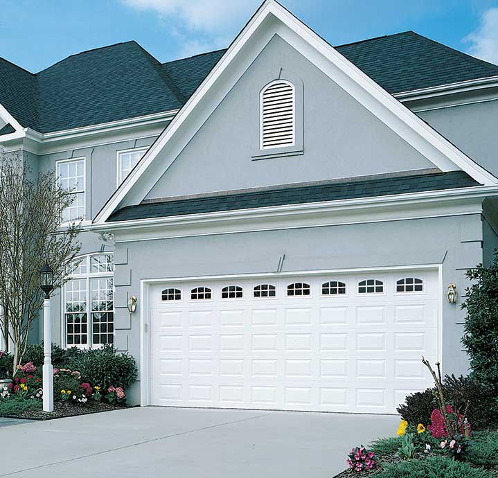 short panel design in true white steel double garage door with cascade decorative windows