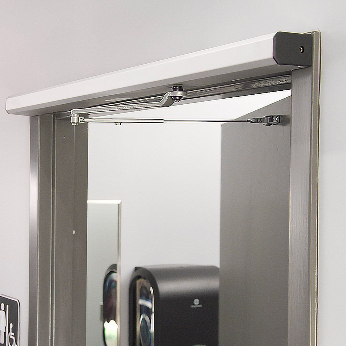 Record HA7 swing operator on a single use restroom door.