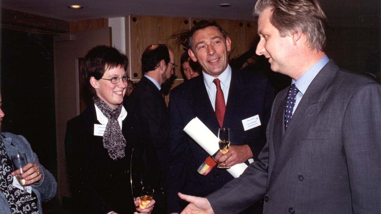 Dynaco workers meet and shake hands with the king of Belgium. 