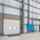 ASSA ABLOY OH1142P dual drive sectional door in a warehouse environment