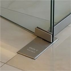 Enox floor spring installed on glass door