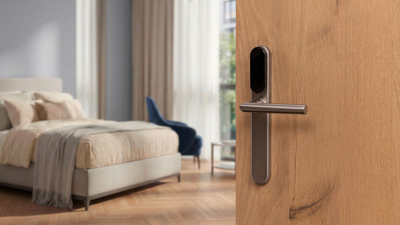 An i-max escutcheon fitted on the outside of a hotel room